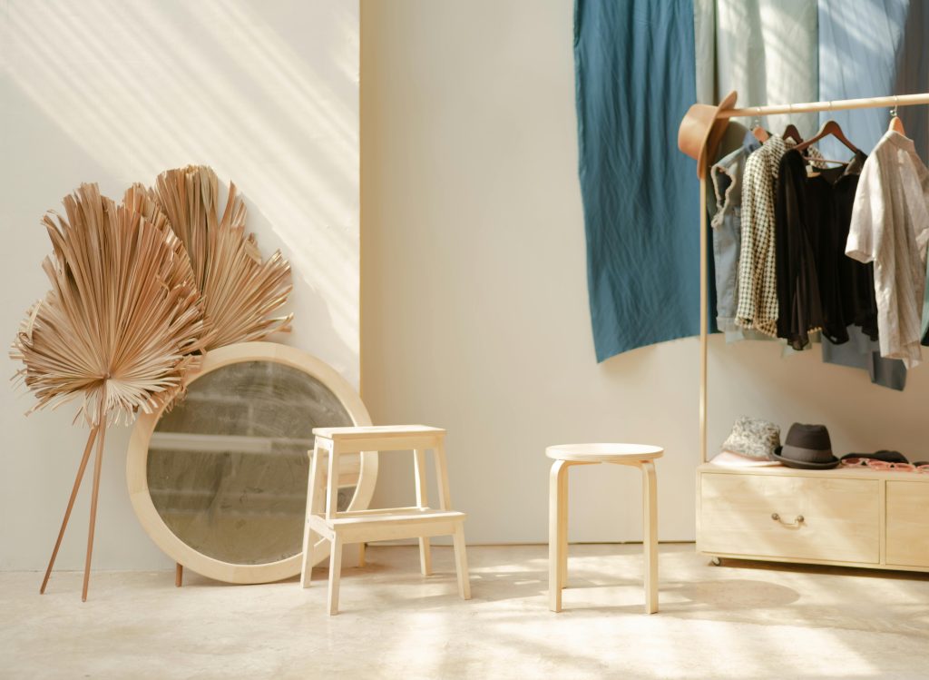Best Furniture Design Materials for Sustainable Interiors 1 Explore a serene minimalist room with natural wooden decor, perfect for inspiration.